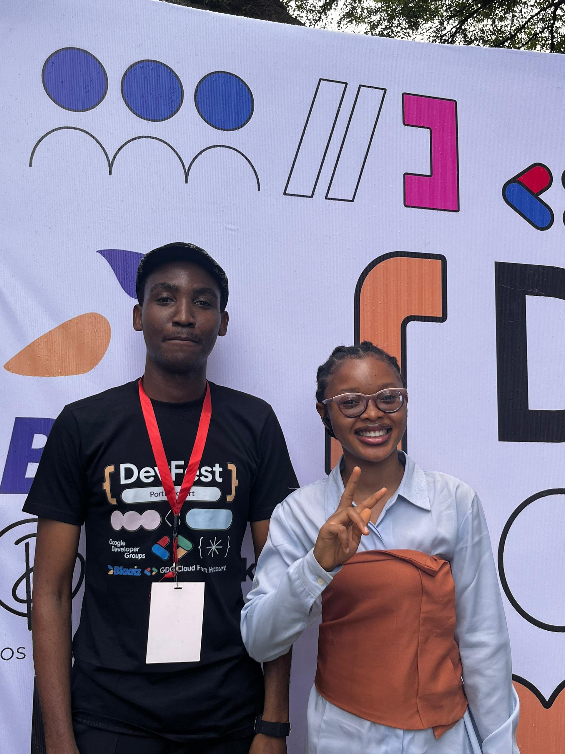 With a fellow attendee at DevFest Port Harcourt 2025.