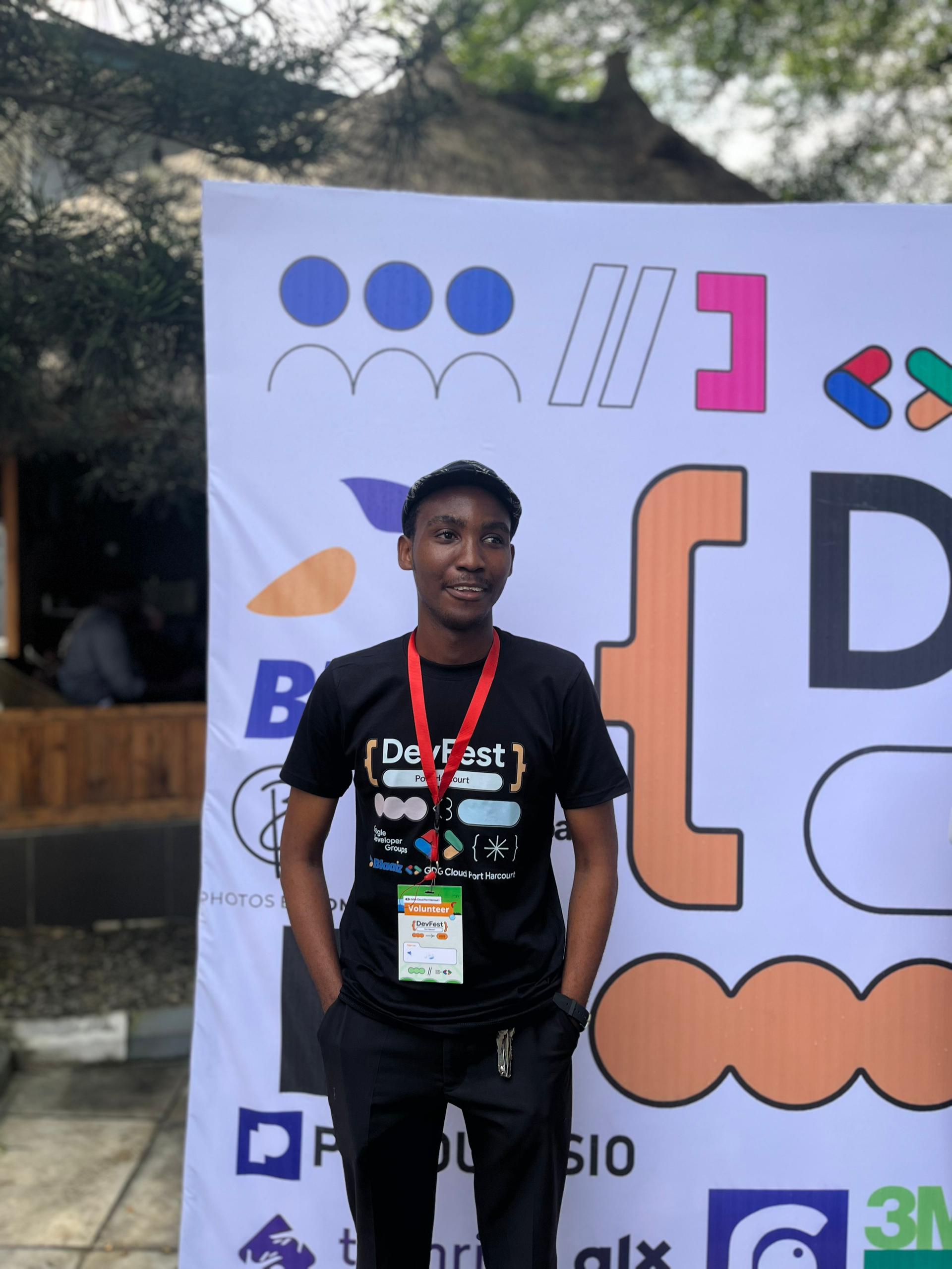 At the DevFest Port Harcourt 2025 backdrop.